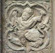 Panel 12:01 - Lion-legged centaur with sword (?) and buckler